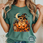 Golden Retriever in a Jack-o-Lantern T-shirt